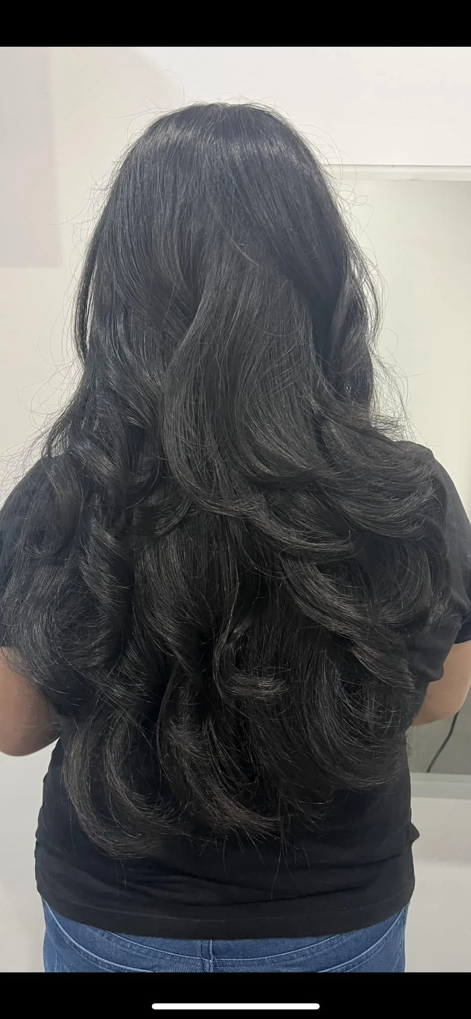 Long jet-black voluminous waves — Kaur's Beauty